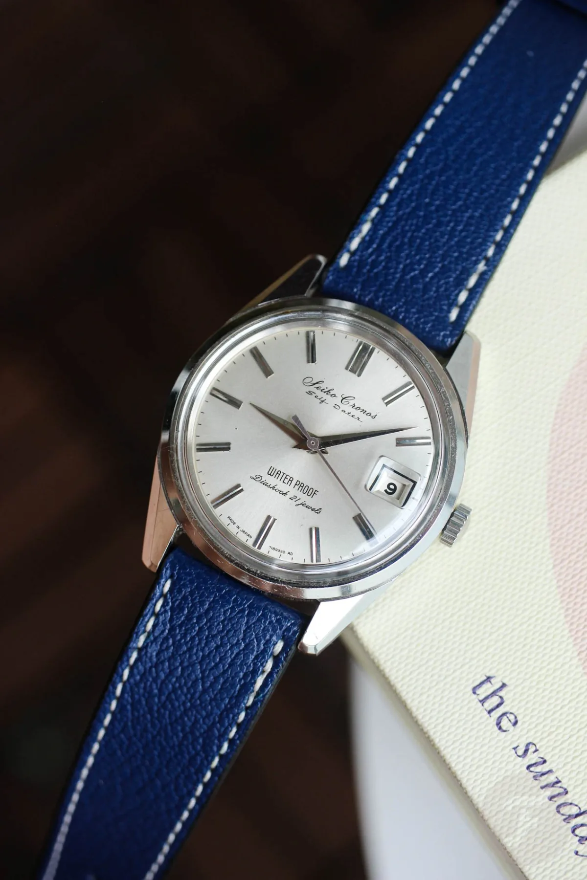 Vintage Seiko Cronos watch with a sunburst dial