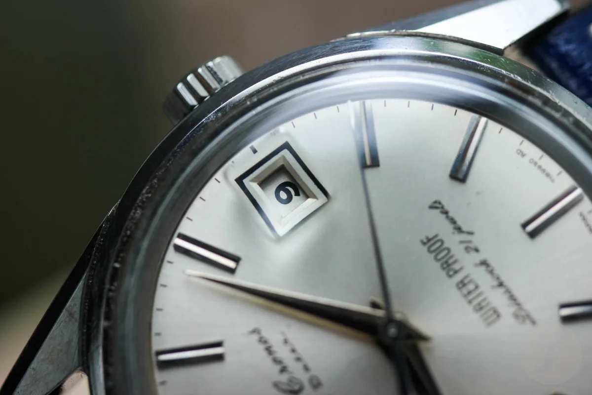 Seiko Cronos watch with original glass showing scratches