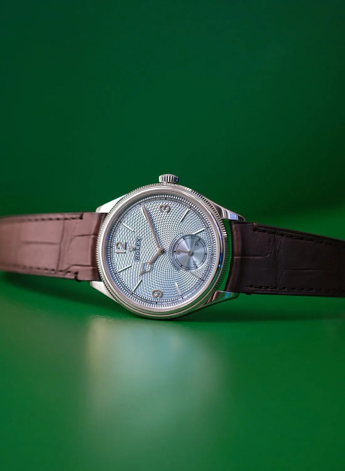 Rolex Perpetual 1908 Platinum guilloche dial in natural light