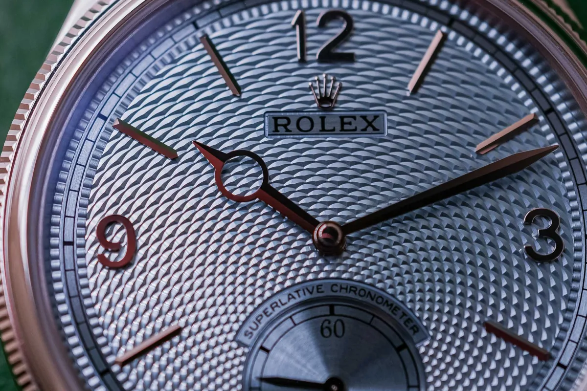 Detailed view of Rolex Perpetual 1908 Platinum dial textures