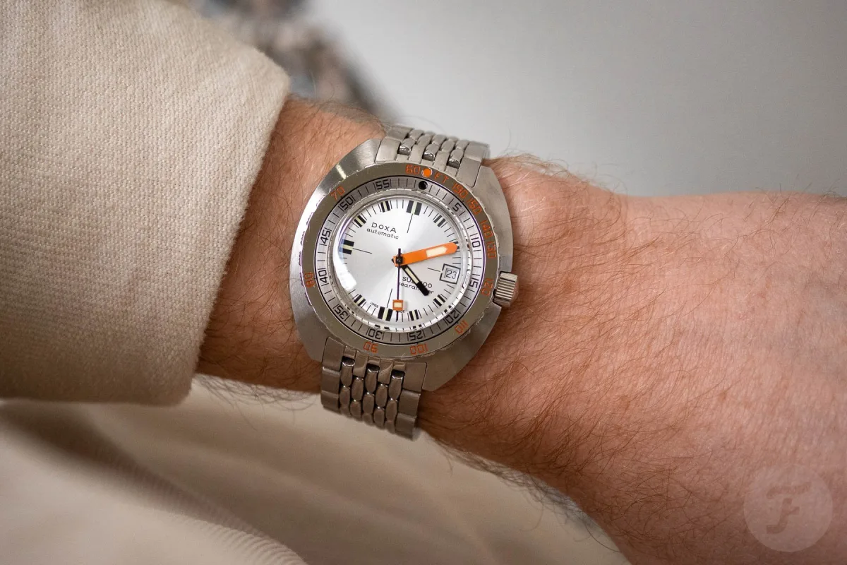 Doxa Sub 300 with cushion-shaped case and colorful dials