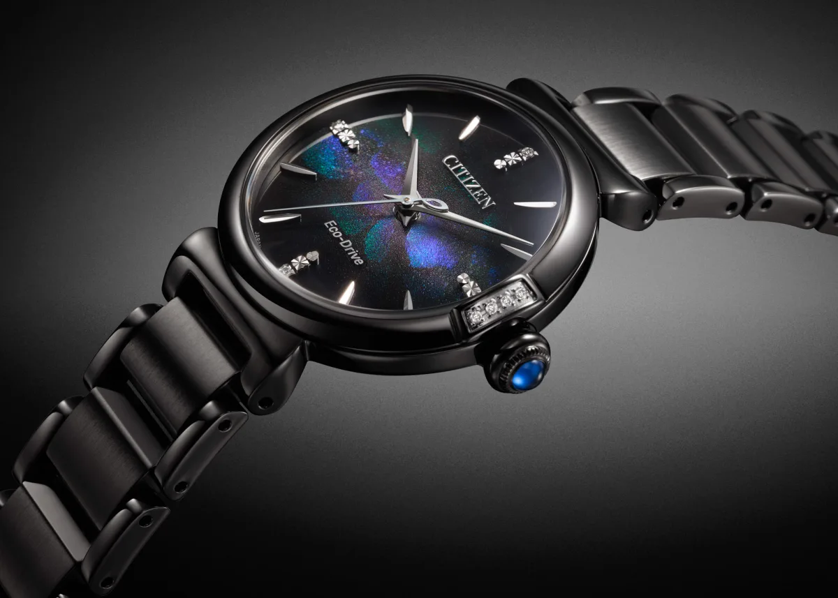 Side view of the Citizen L Mae featuring a blue cabochon crown