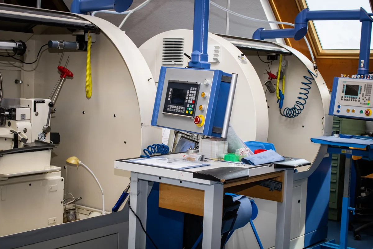 CNC machine processing metal at Watchland