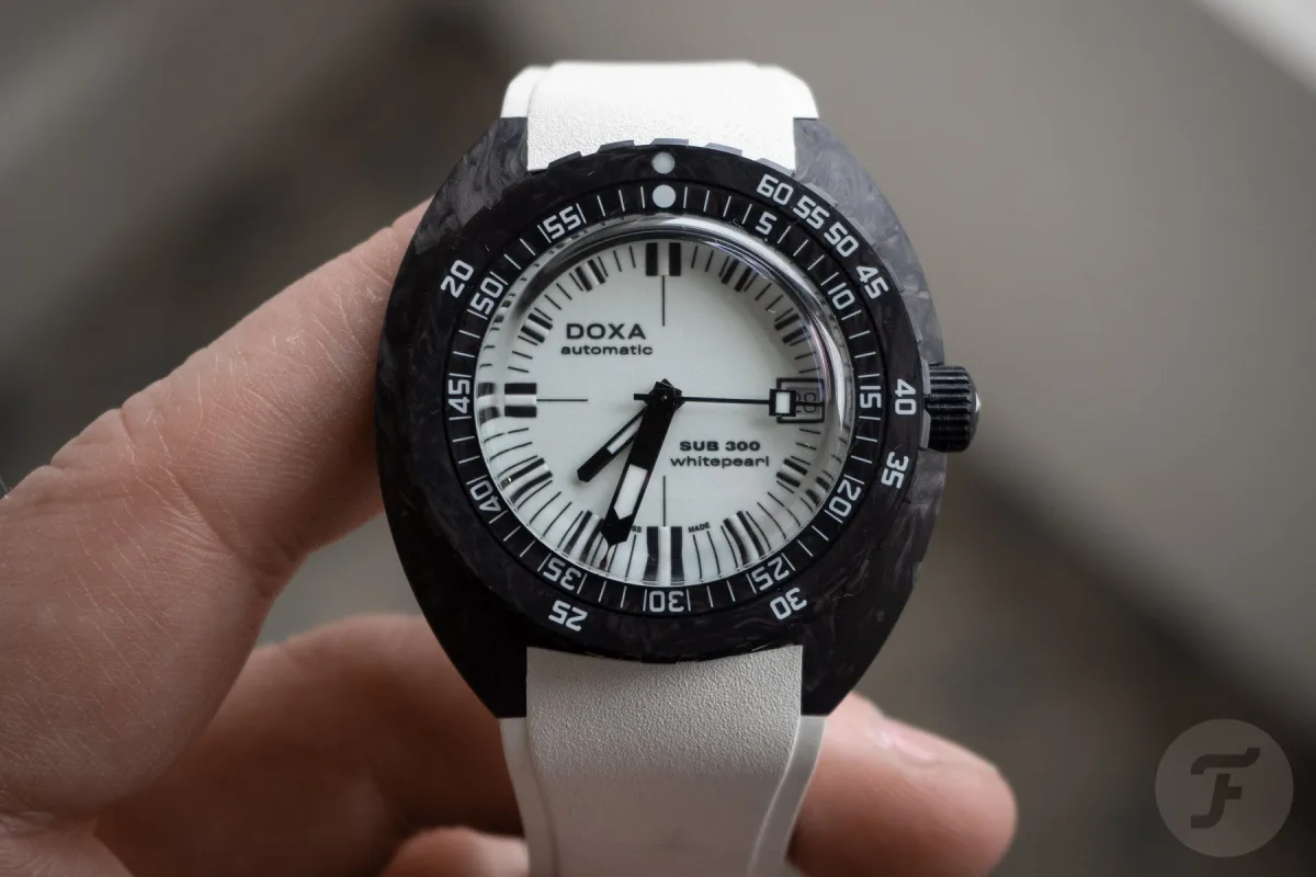 TAG Heuer Aquaracer on wrist with luminous dial