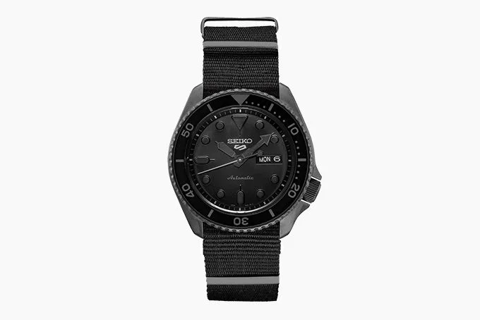Seiko 5 Sports SRPD79 watch with all-black design.