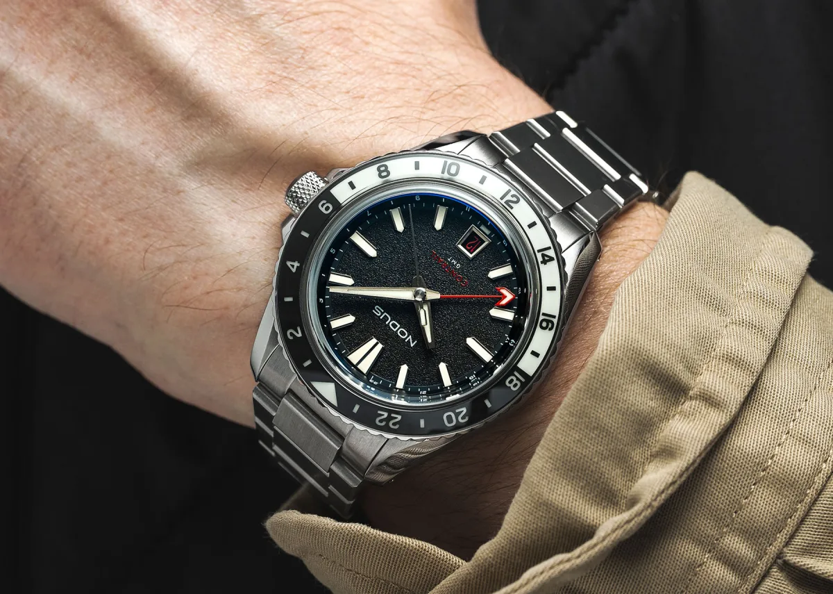Black sand-textured dial of Nodus Contrail GMT
