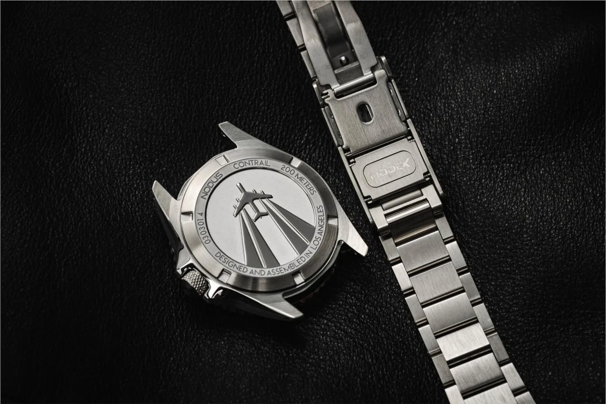 Luminous hands and indices on Nodus Contrail GMT