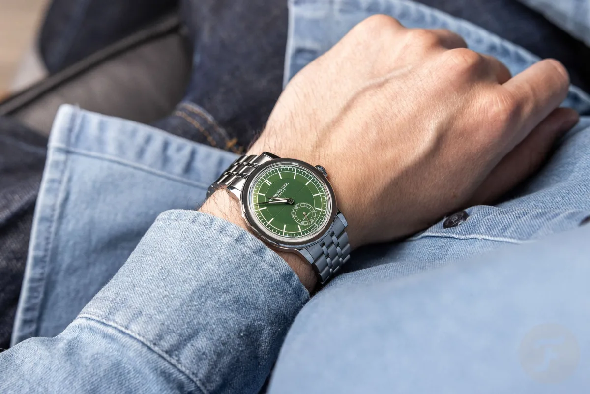 Close-up of green dial and bracelet detail