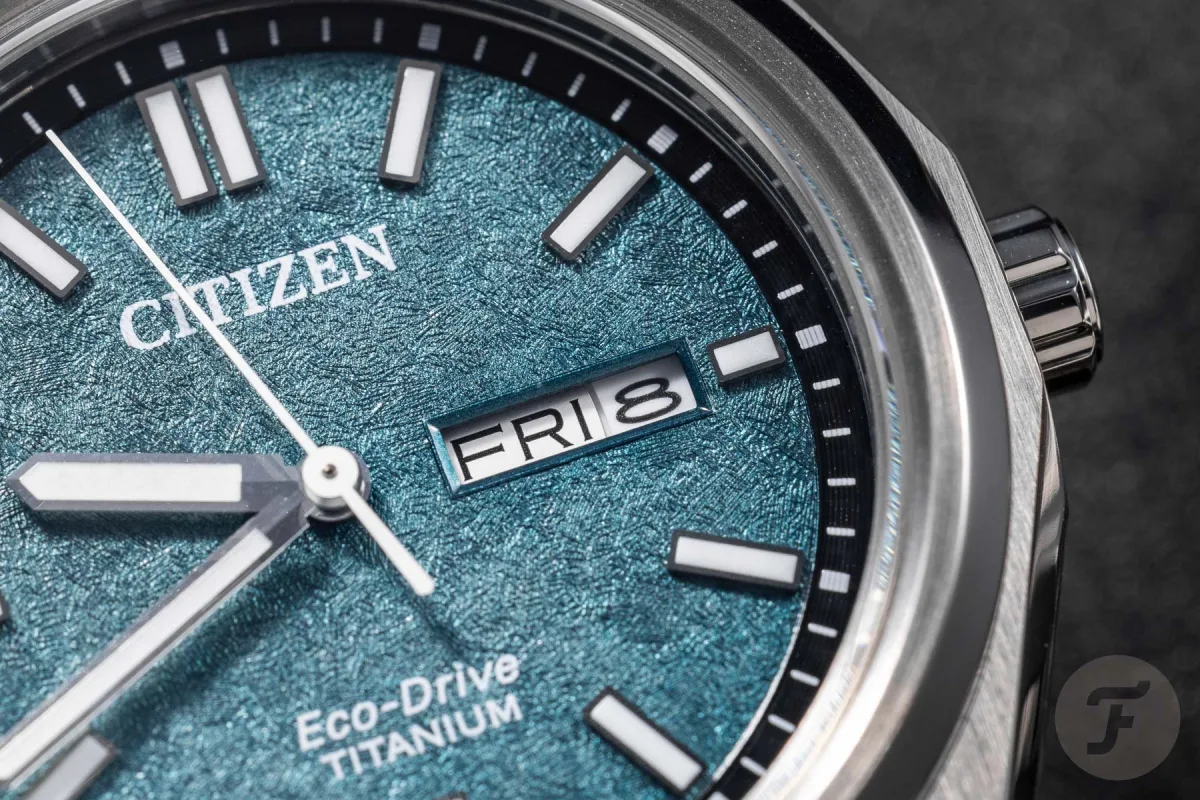 Citizen Super Titanium Eco-Drive Day-Date watch with various dial colors
