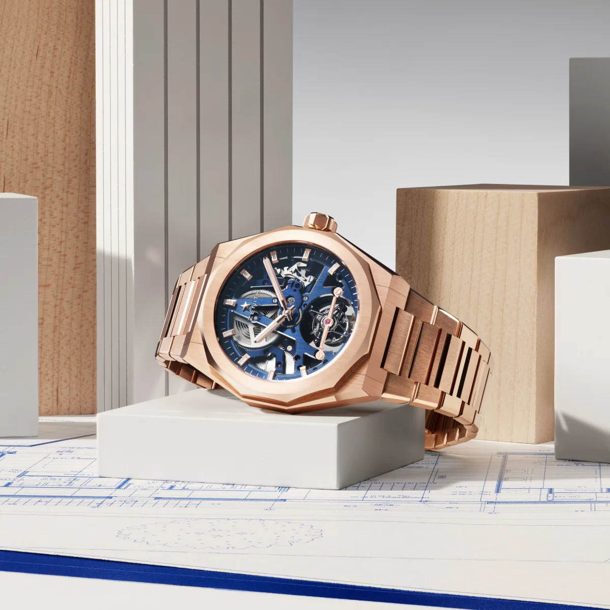 Zenith watch with rose gold bracelet and blue rubber strap option