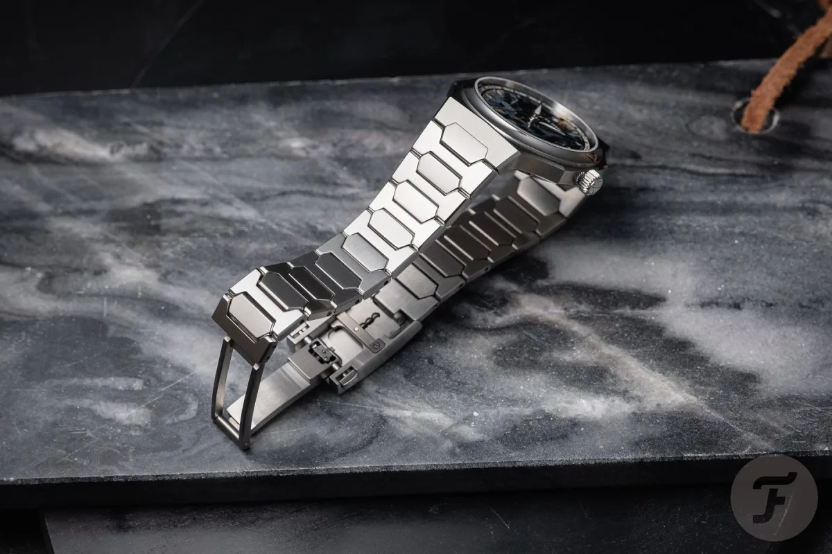 Polished pietersite dial of Atelier Wen watch