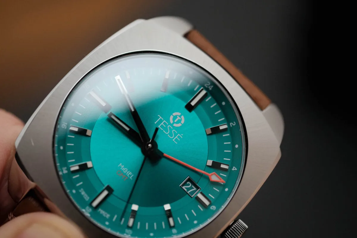 Tessé Michel GMT Electric Teal dial with baton markers