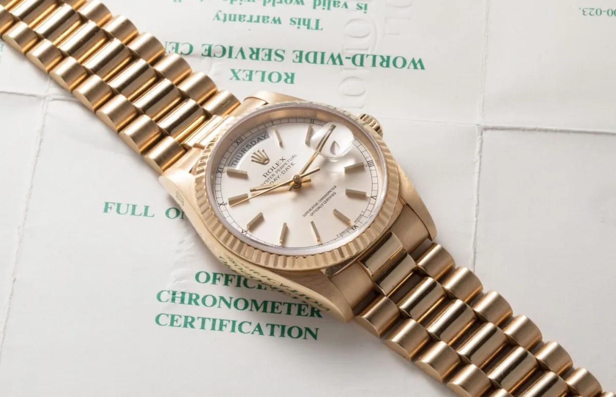 Yellow gold Rolex Day-Date on wrist