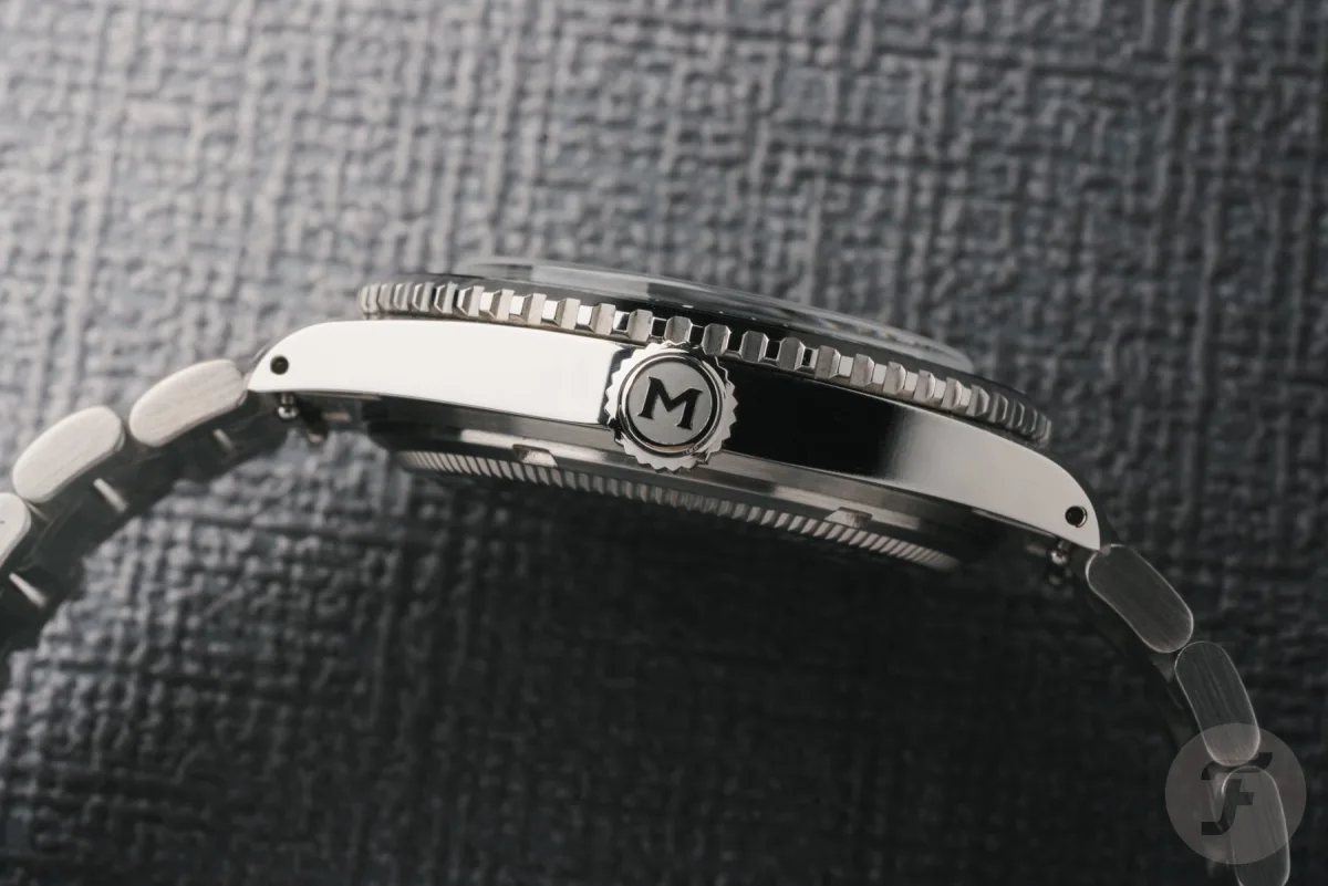 Close-up of Maen Hudson 38 MK5 case and drilled lugs