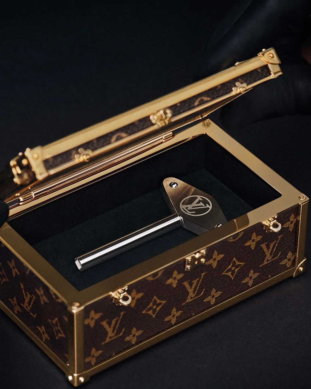 Louis Vuitton van clock rotating cylinders