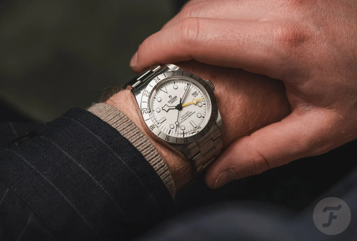 Friendly handshake between watch enthusiasts