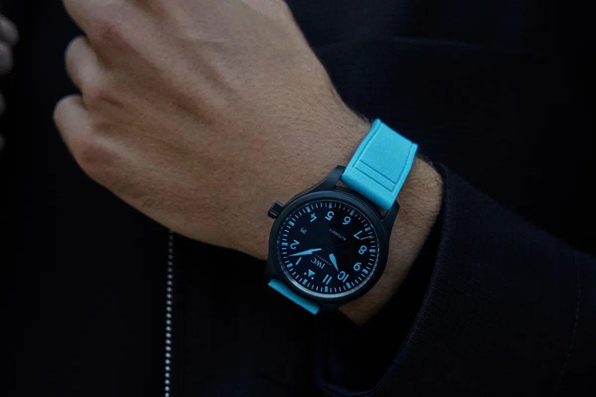 Close-up of George Russell IWC watch dial with signature blue accents