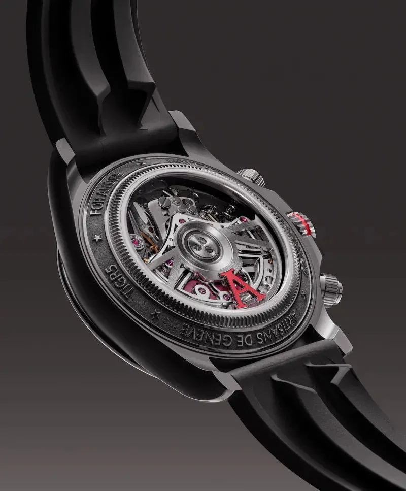 Sandblasted central chronograph hand with Hot Lava® colored counters