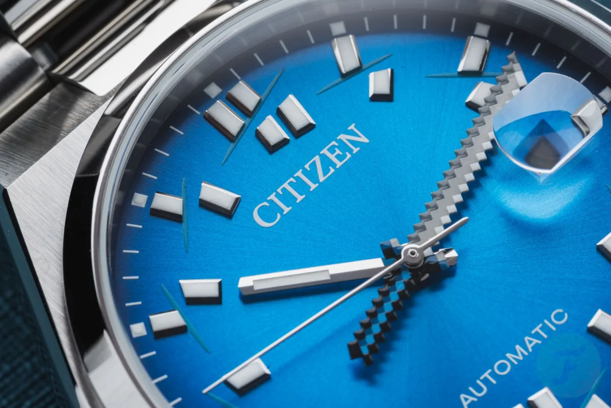 Close-up of the blue sunburst dial with sliced indices on Citizen Tsuyosa