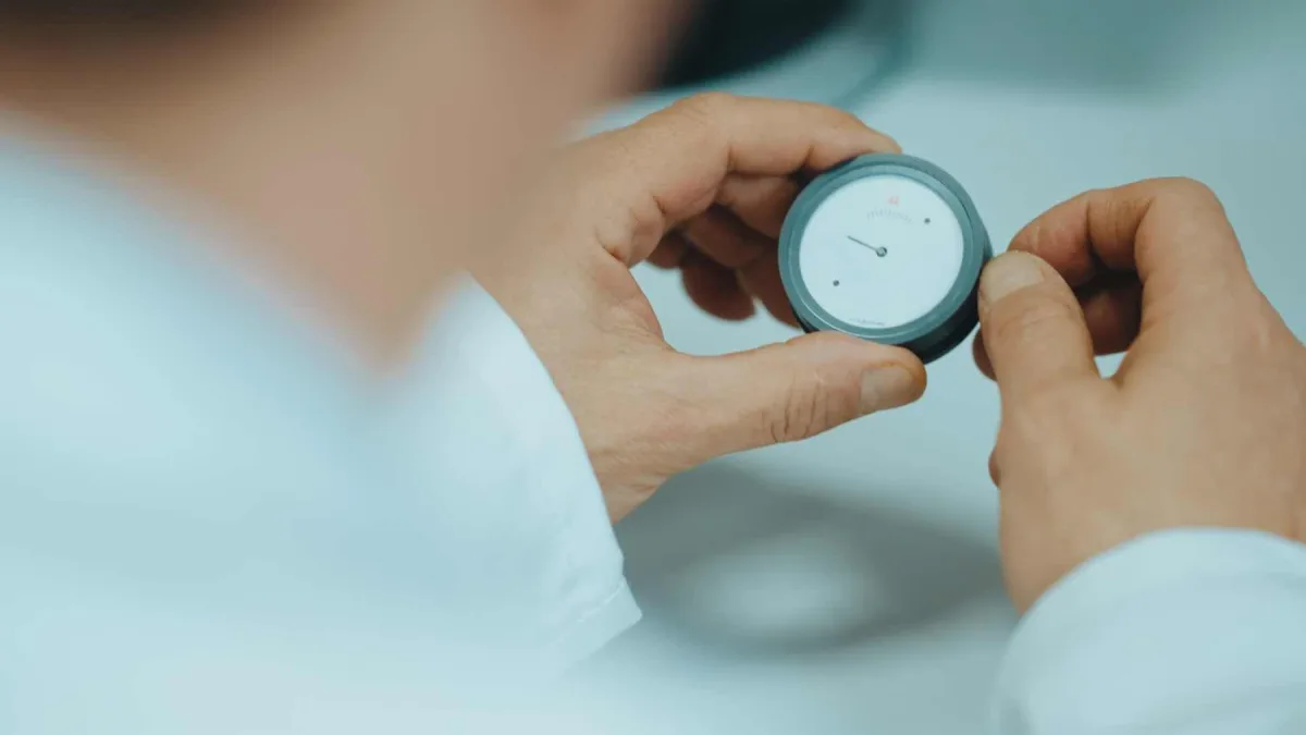 Watch exposed to magnetic field for testing