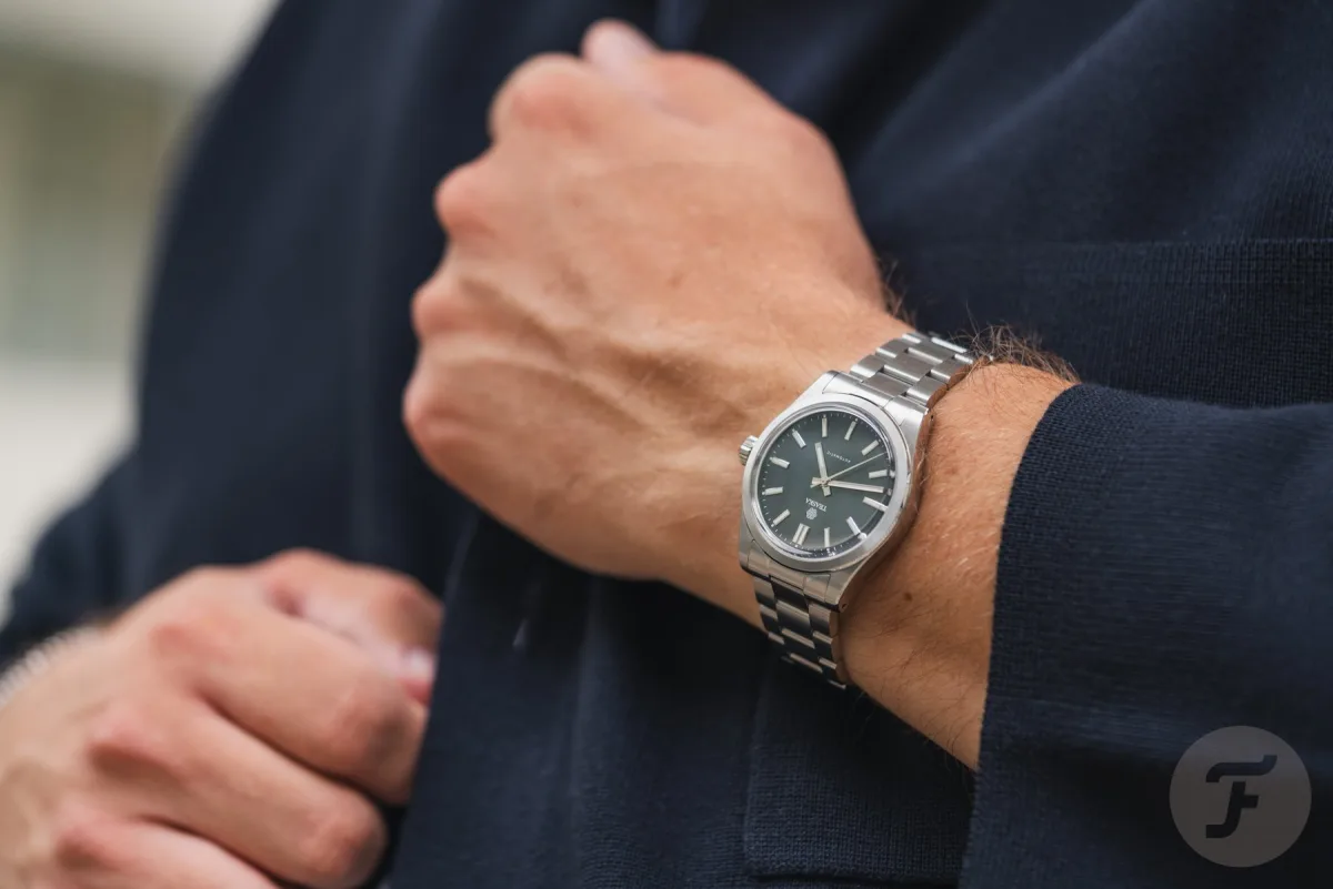Traska Commuter with sunburst dial and baton indexes
