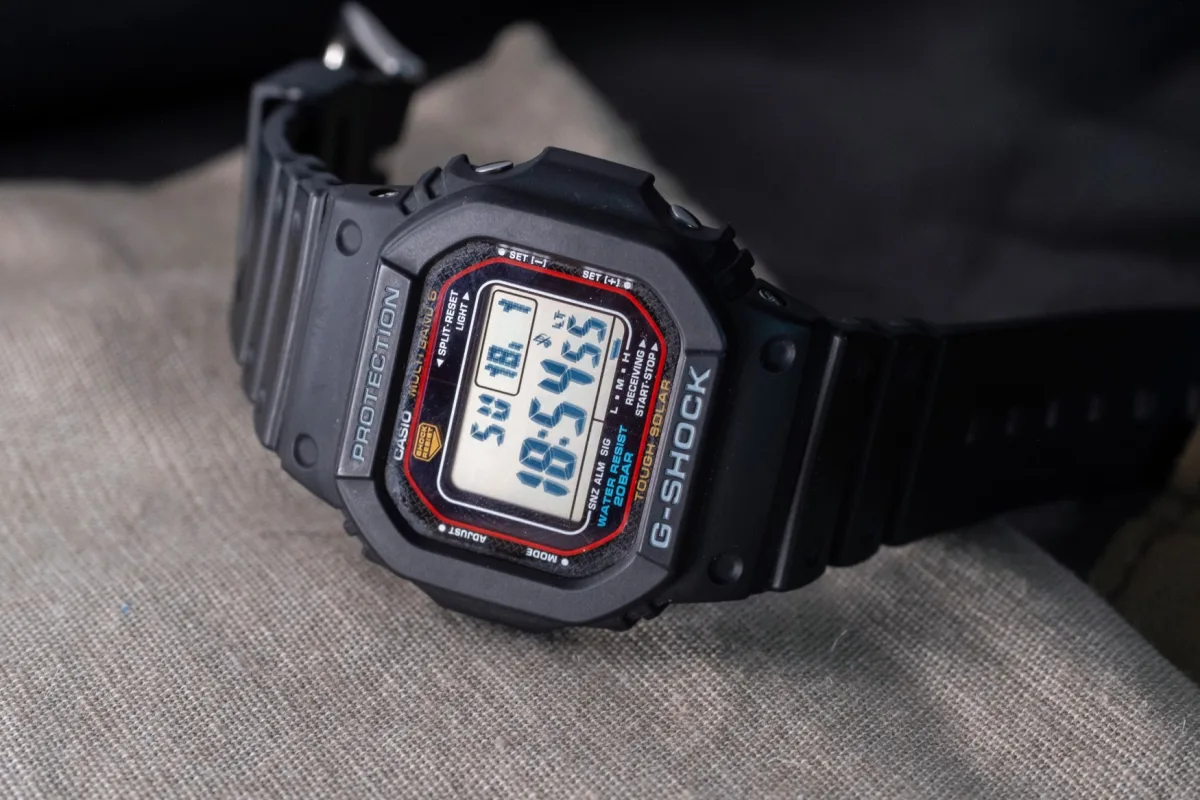 Collector's watch display with financial focus