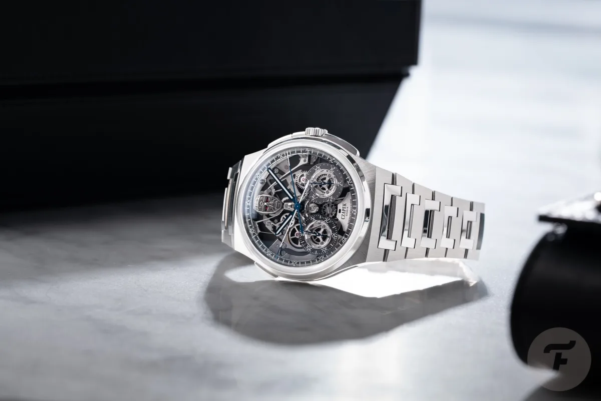 Watch enthusiast examining a watch movement