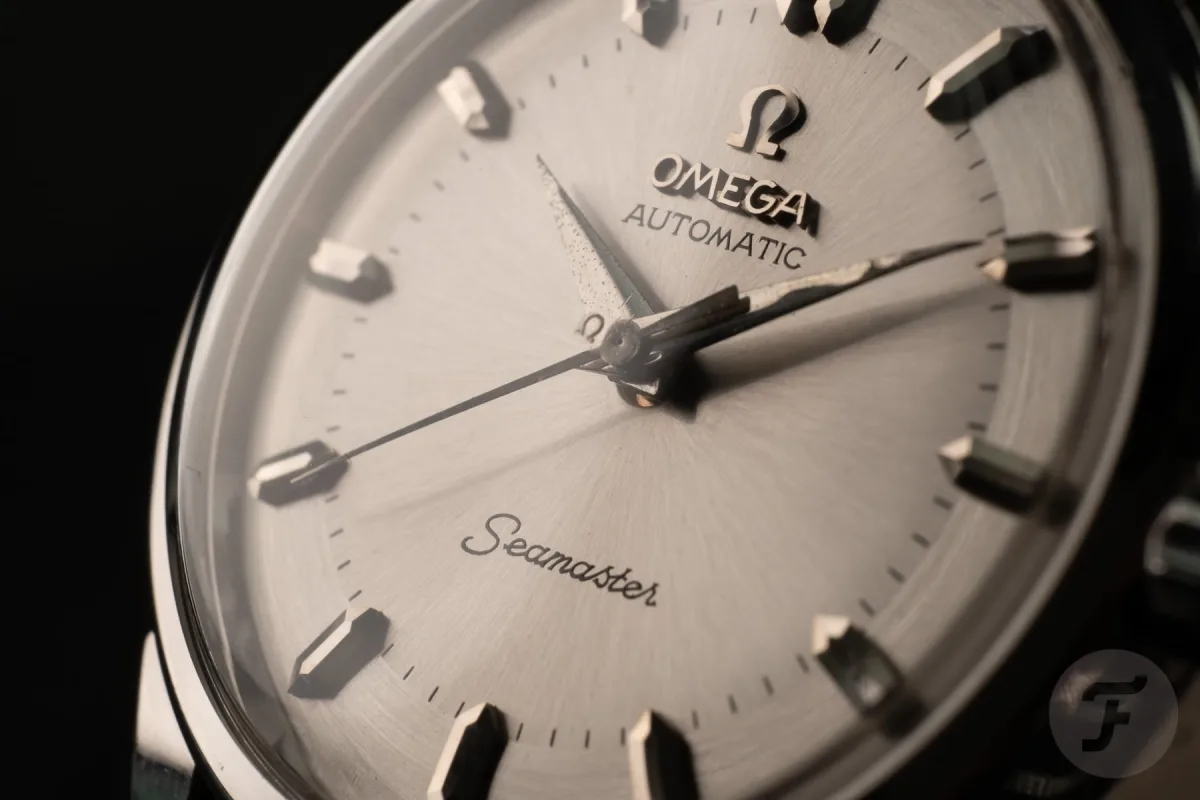 Close examination of a vintage watch for restoration signs