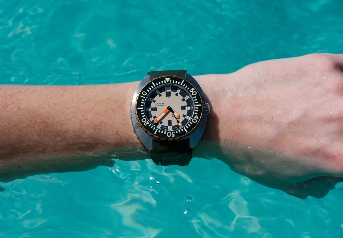 A view from a beach on Barbados with the Doxa Army watch