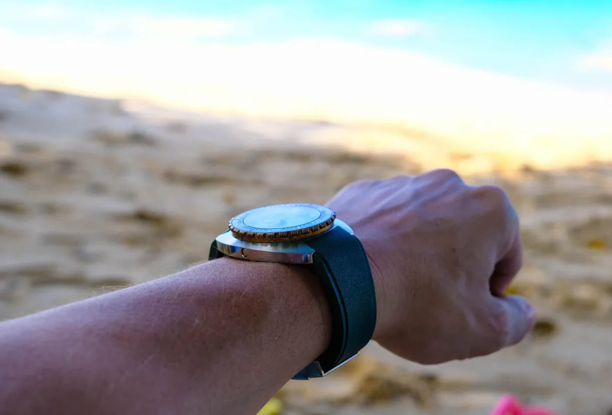 Close view showing Doxa Army's orange hands
