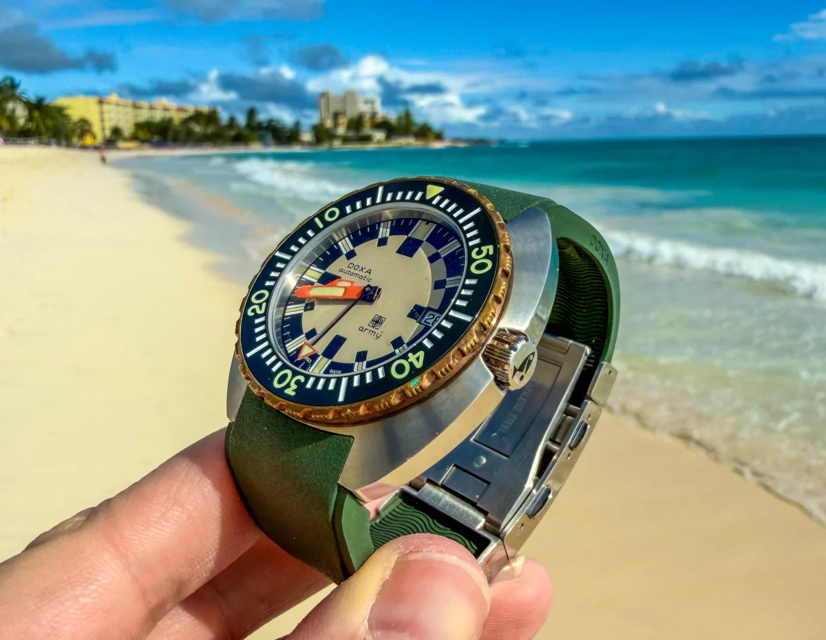 Doxa Army watch bezel with developing patina