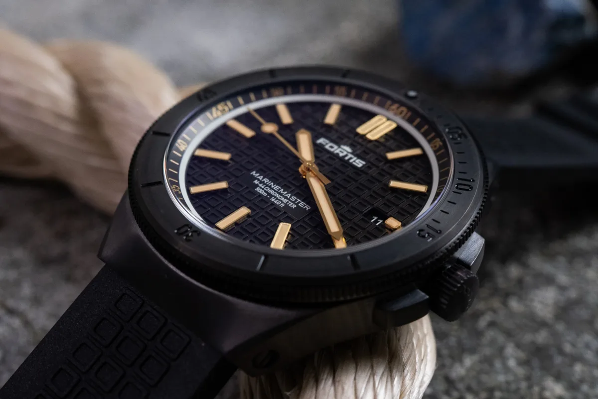 Close-up of Fortis Marine Master M44 dial with mesh pattern