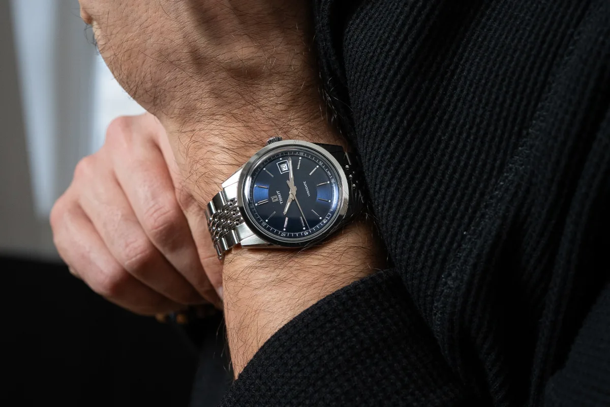 Expanded date window on Tissot Visodate black dial