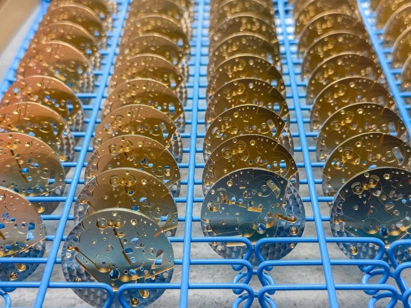Artisan working on luxury watch details