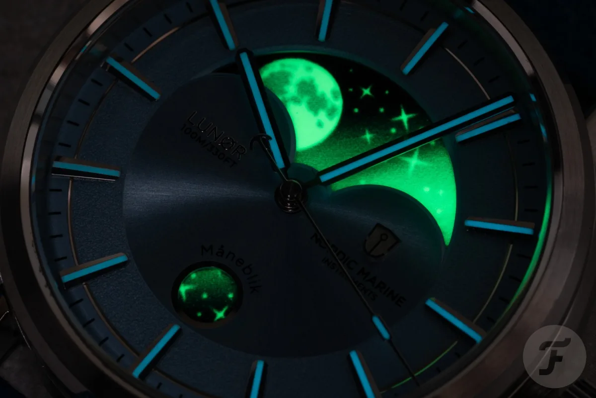 Textured dial of Lunør with moon phase indicator