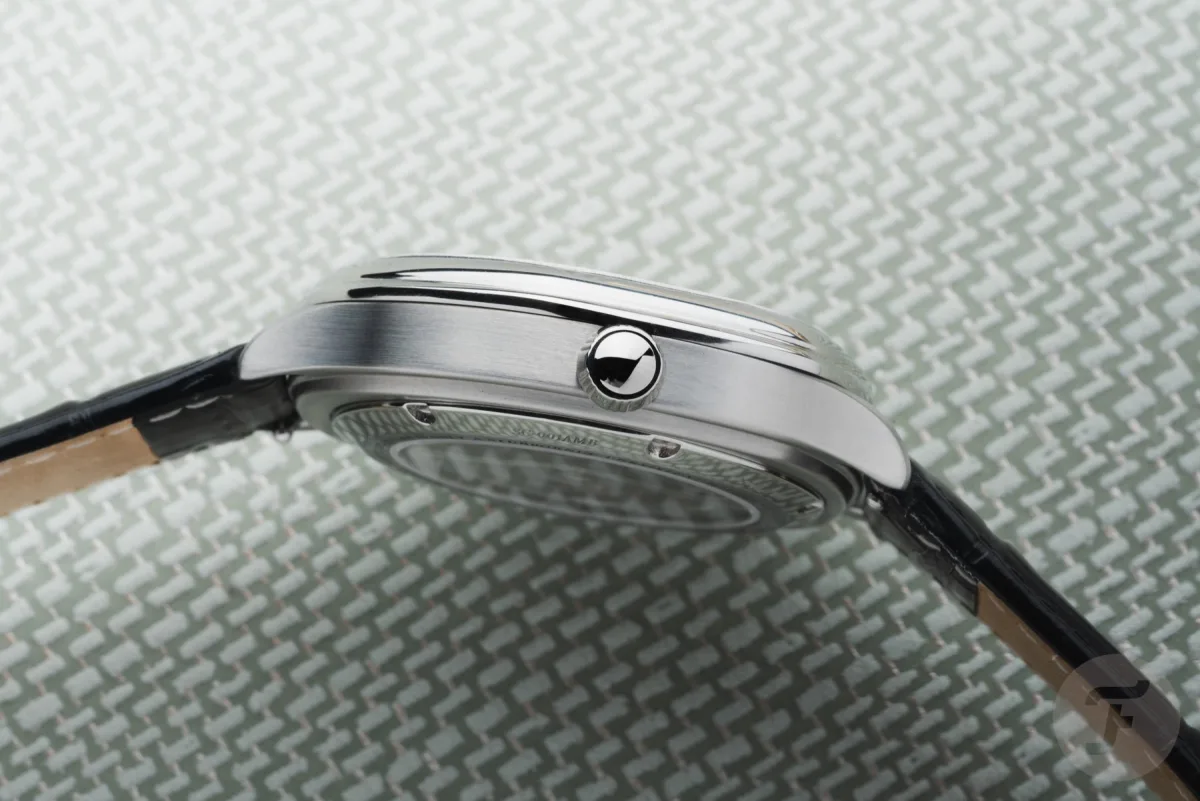 Semicolon Anachron stainless steel case side view