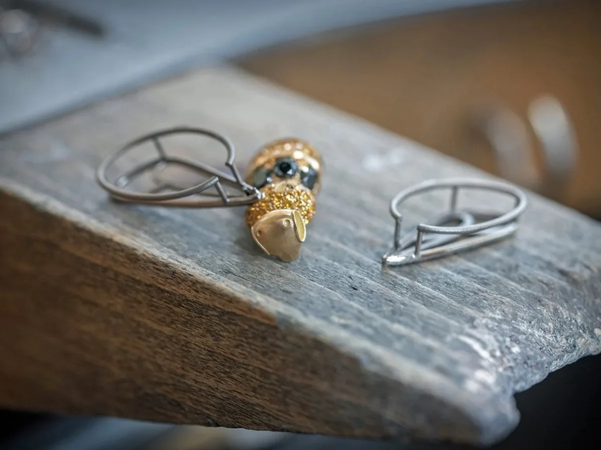 Three 18K gold bees on The Beehive Table Clock