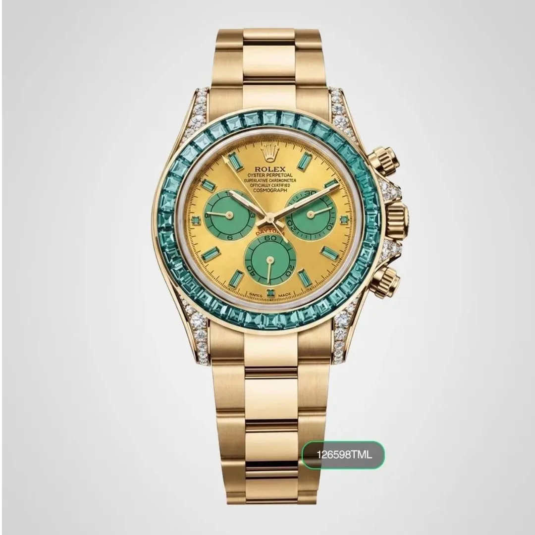 Rolex Daytona with yellow gold case and green sapphire bezel.