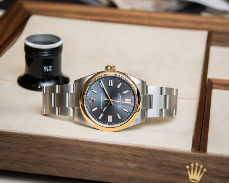 Yellow gold bezel detail on Rolex Oyster Perpetual 'Oyster 100'