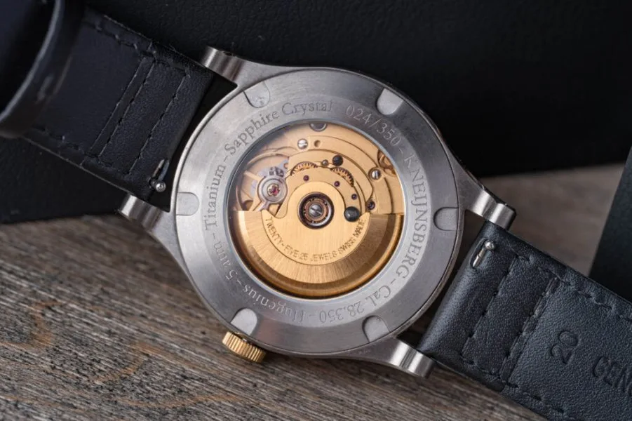 Sapphire case back showing Hugenius movement