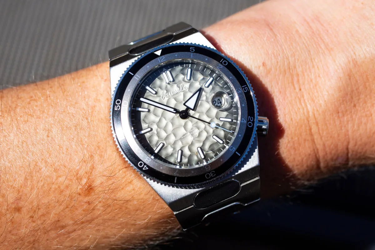 Textured dial and hands of Bausele Elemental