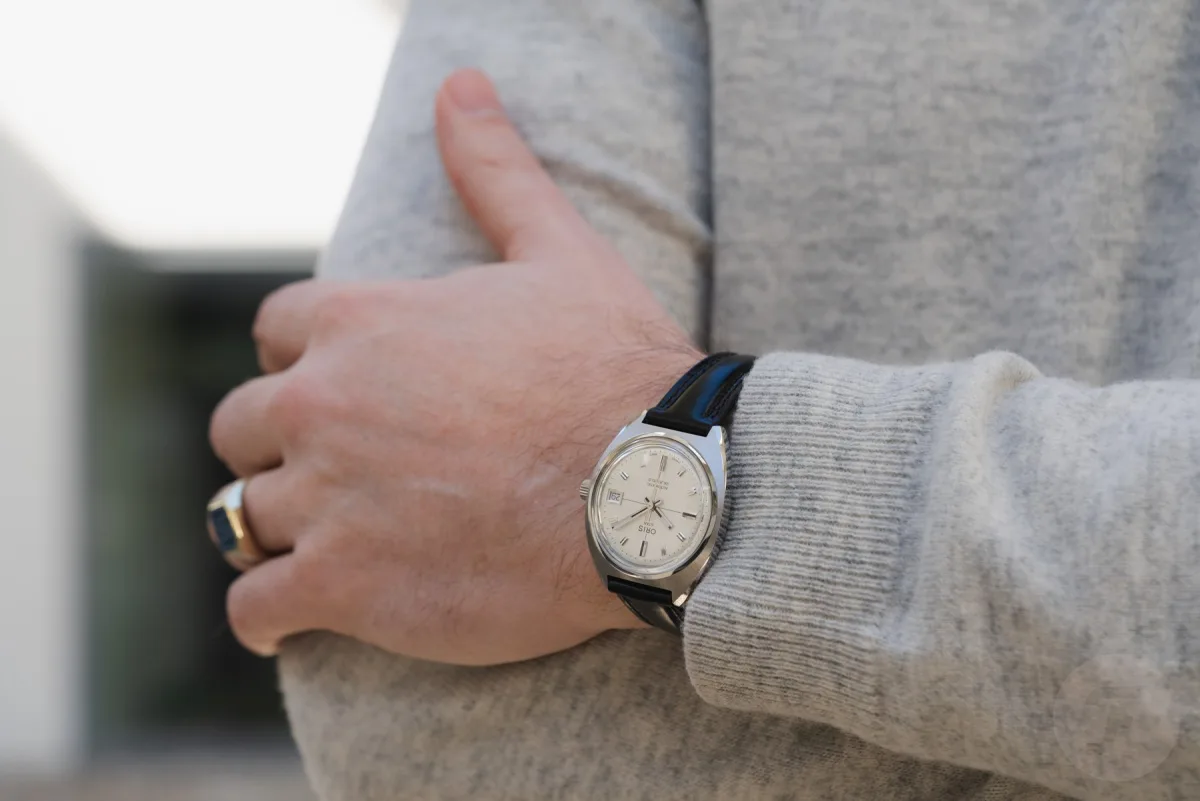 Silver dial of Oris Star with Super-LumiNova.