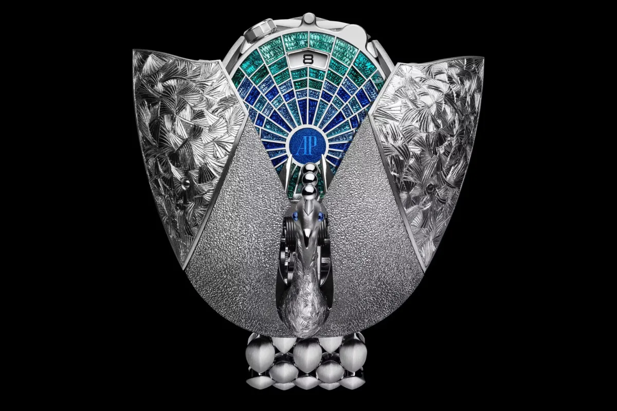 Établisseurs Peacock watch with spread wings revealing dial