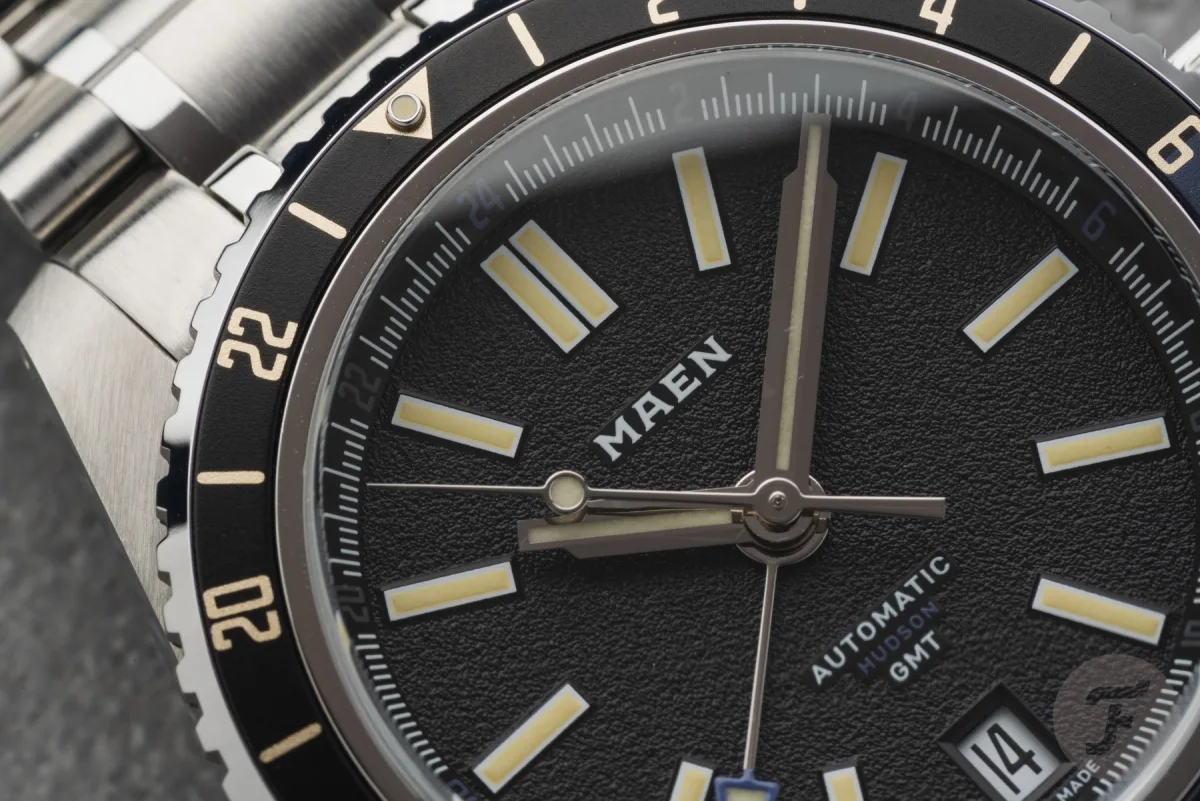 Dial of Maen Hudson GMT MKII with luminescent markers