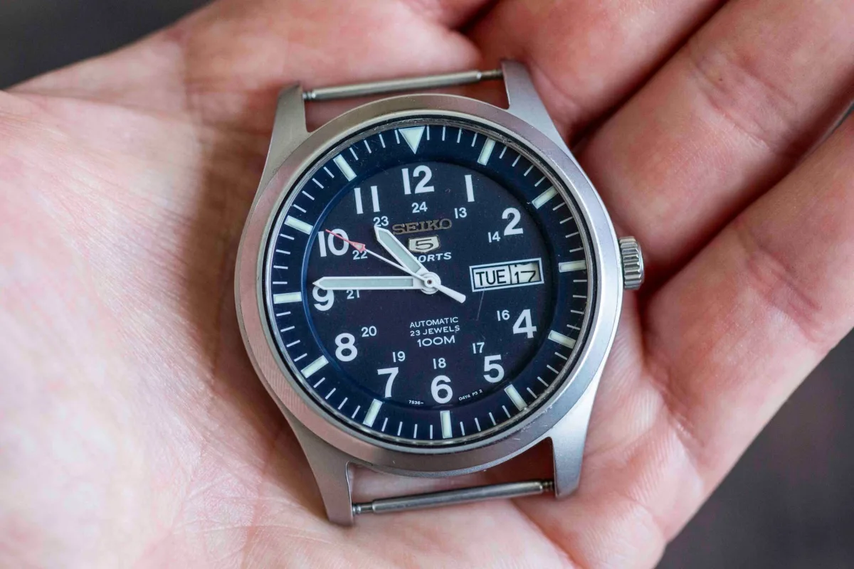 Seiko 5 Sports SNZG11 with classic field watch style.