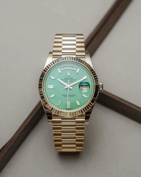 Close-up of Rolex Jubilee gold watch in light