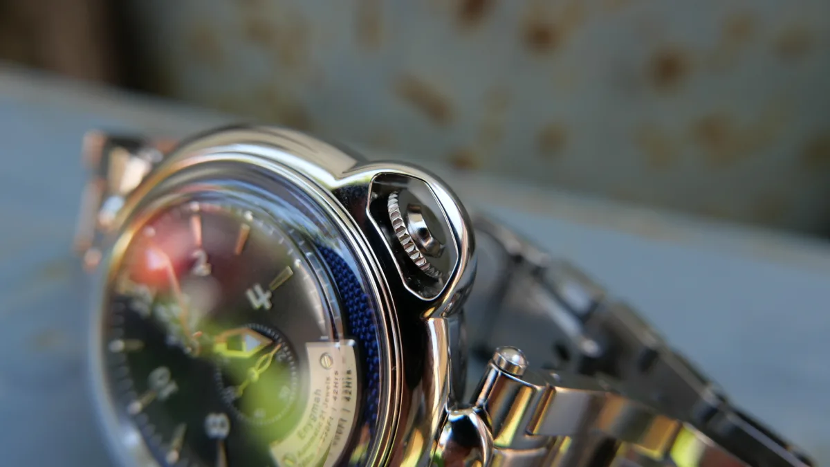 Side view of the Enygmah watch showing the crown protection.
