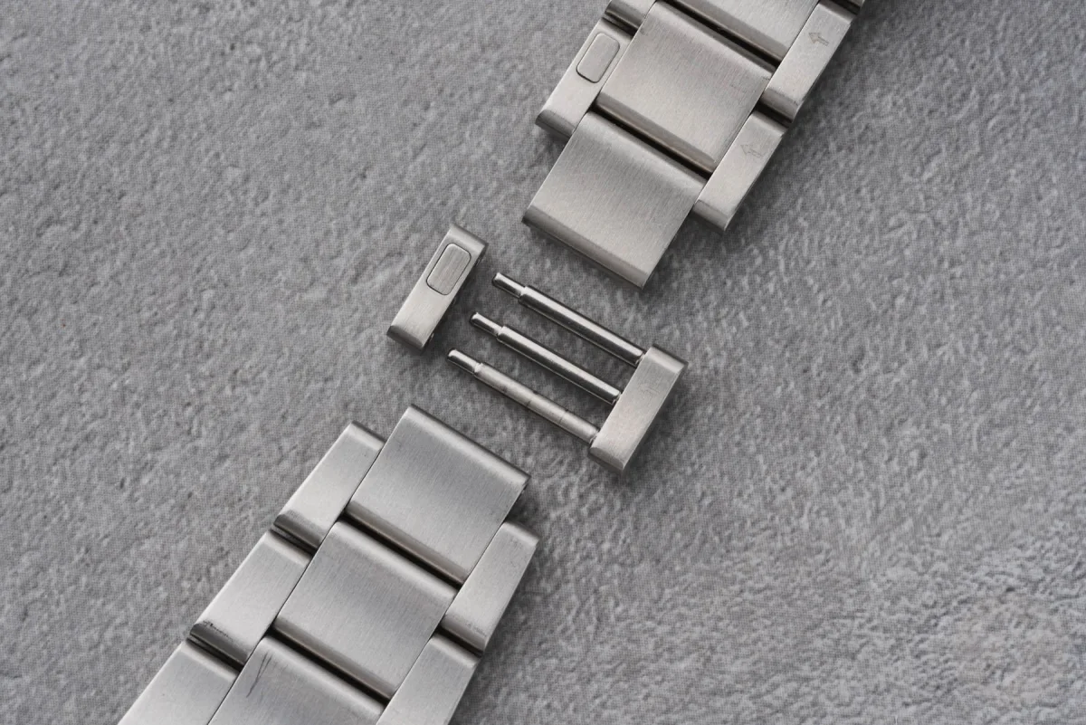Detail of the iLink system on Christopher Ward bracelets.