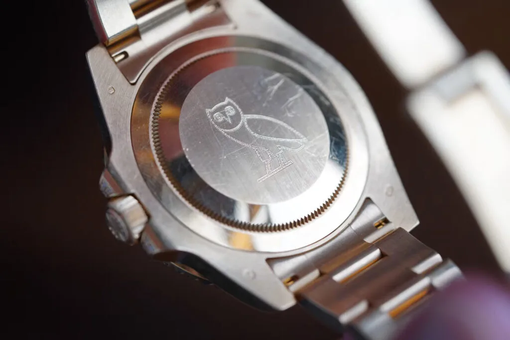 Back of Drake's Rolex showing owl engraving for OVO brand