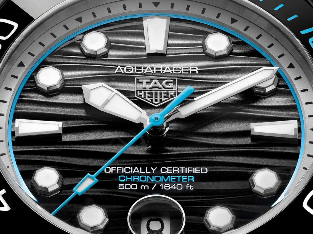 Dial of TAG Heuer Aquaracer with wave pattern and date window